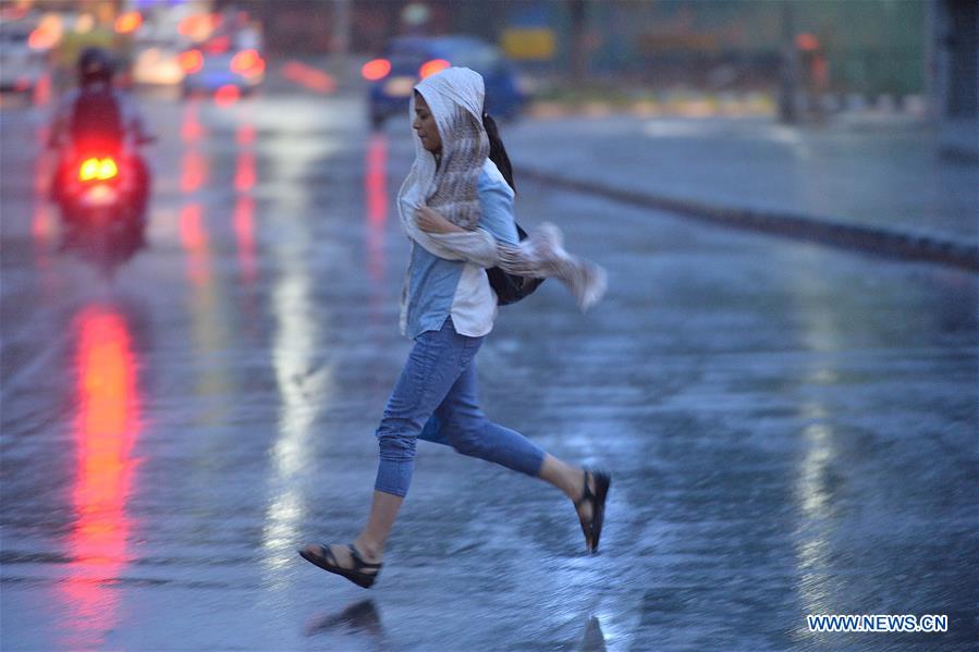 INDIA-BANGALORE-WEATHER-RAIN