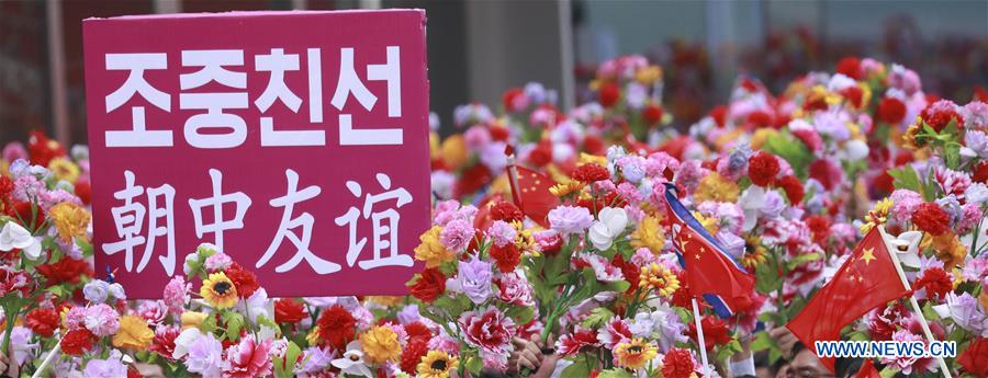 DPRK-PYONGYANG-XI JINPING-PEOPLE-WELCOME