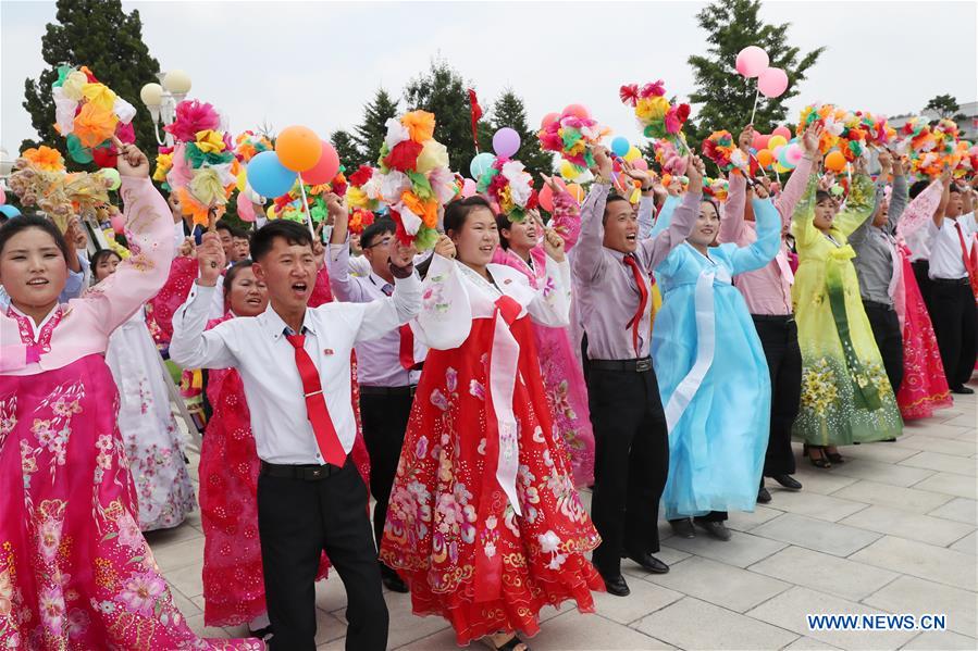 DPRK-PYONGYANG-XI JINPING-PEOPLE-WELCOME