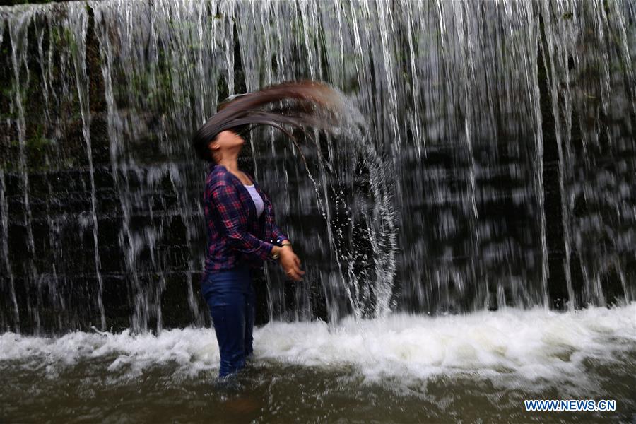 NEPAL-BHAKTAPUR-WATERFALL FUN