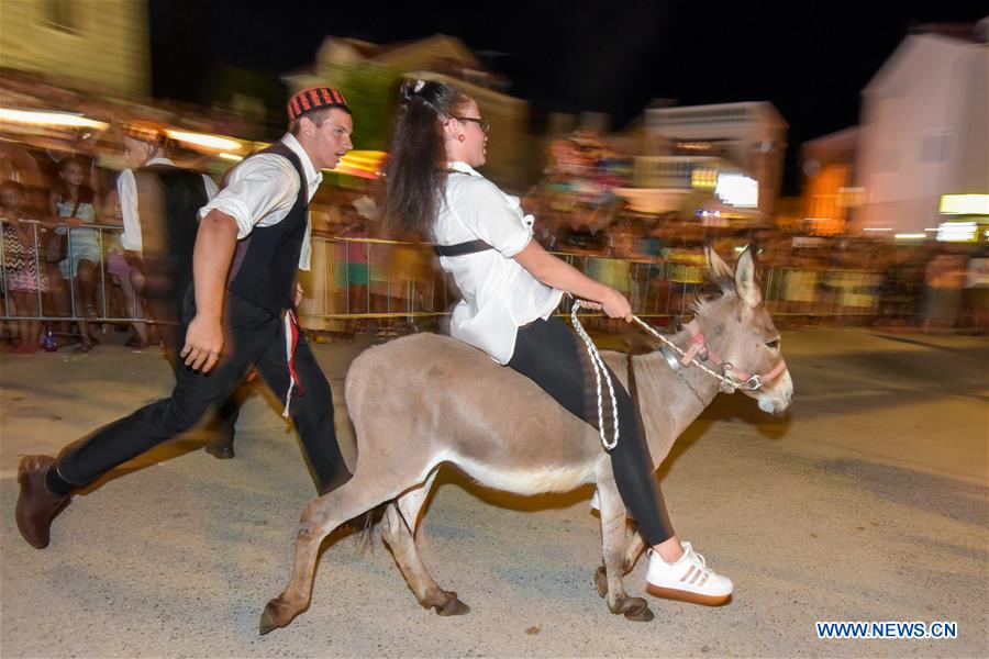 CROATIA-TRIBUNJ-DONKEY RACE