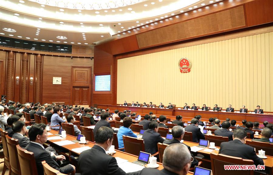 Zhang Dejiang, executive chairperson of the presidium for the fifth session of China's 12th National People's Congress (NPC) and chairman of the Standing Committee of the NPC, presides over the fourth meeting of the presidium for the fifth session of the 12th NPC at the Great Hall of the People in Beijing, capital of China, March 14, 2017.