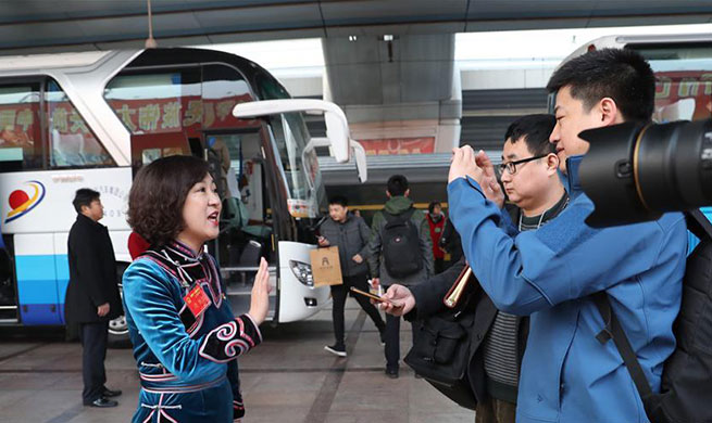 Deputies to 13th NPC arrive in Beijing