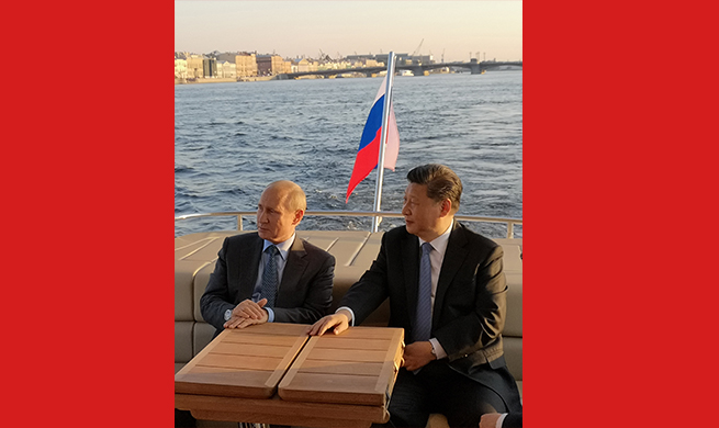 Xi, Putin meet in St. Petersburg