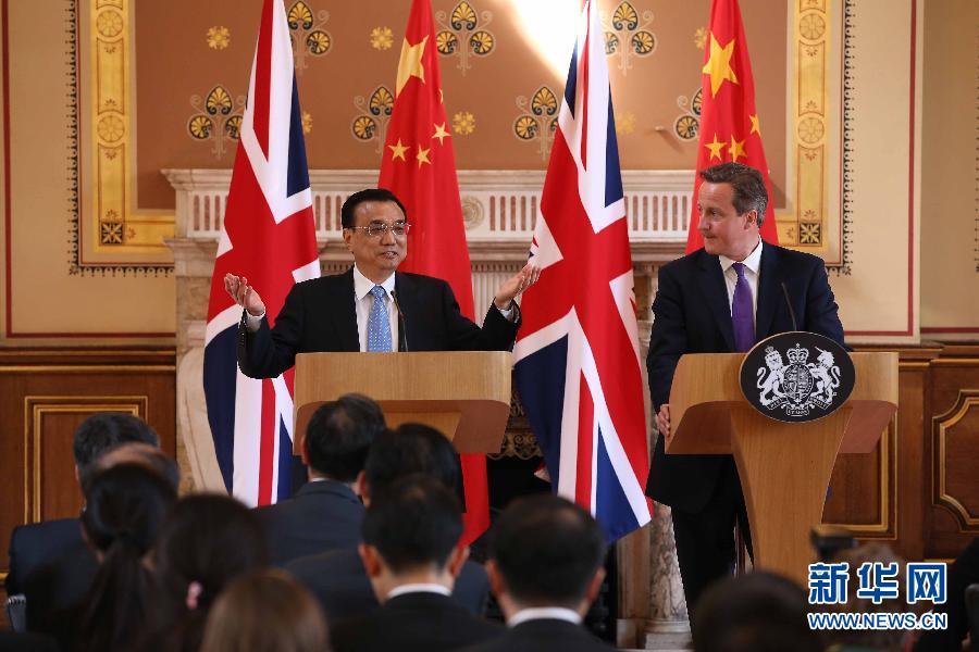 6月17日，國務院總理李克強同英國首相卡梅倫在倫敦舉行中英總理年度會晤后共同會見記者。新華社記者 龐興雷 攝